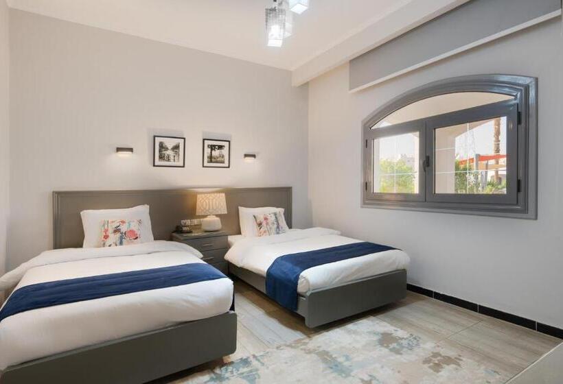 کلبه ییلاقی, Assiut Cement