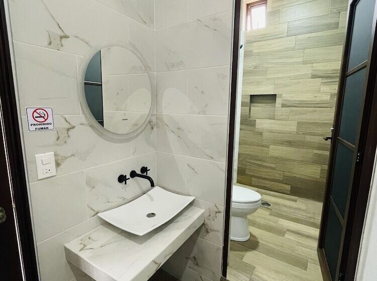 غرفة عائلية, La Gran Manzana