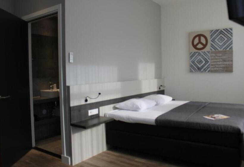 חדר דחוקס עם מיטת קינג, T Peperhuys