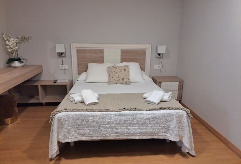 高级大房间, Roquiño