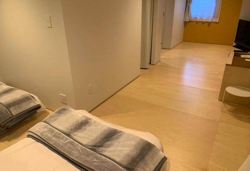 Habitació Triple Deluxe, Crasco Tabi Ne