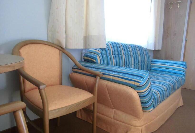 غرفة قياسية مزوَّدة بشُرفة, Pension Runer