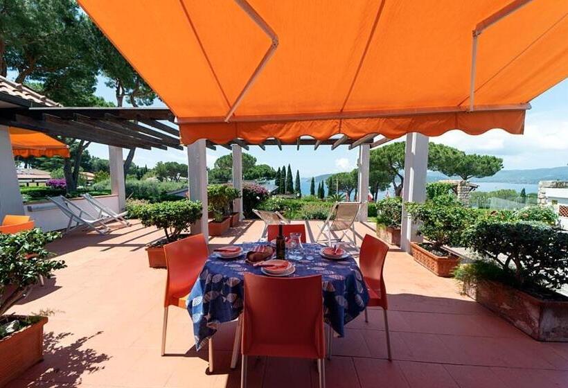 Апартаменты 1 Спальня с Террасой, Residence Le Grazie Est