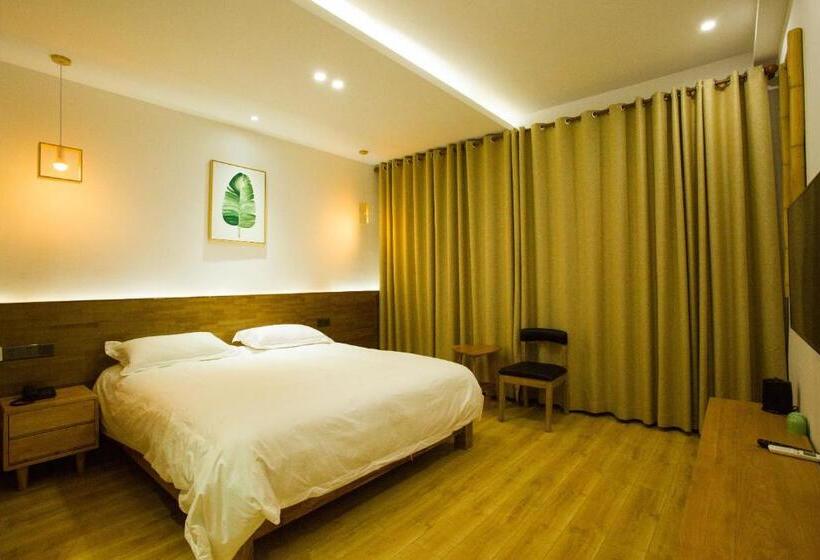 Standardrum King Size Säng, Wally House青山惠风民宿