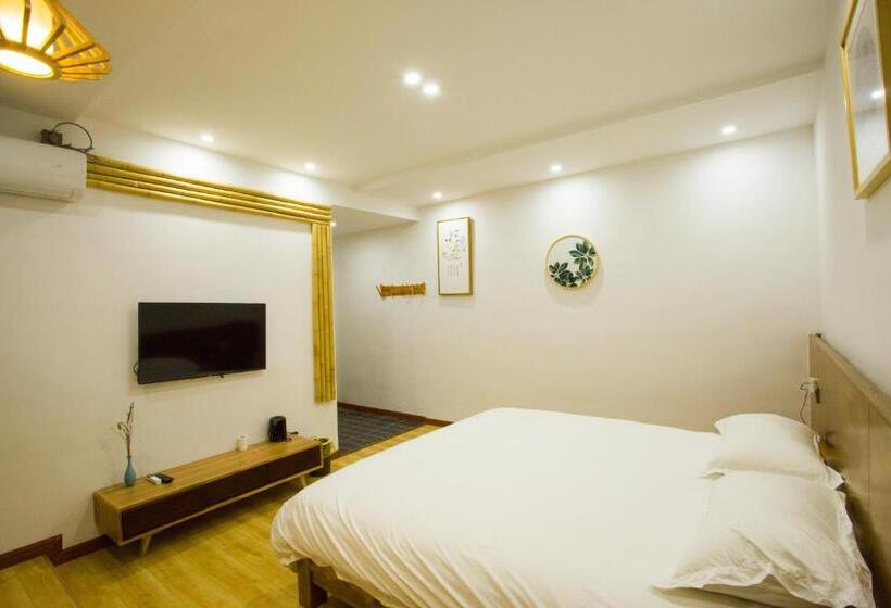 Standardrum King Size Säng, Wally House青山惠风民宿