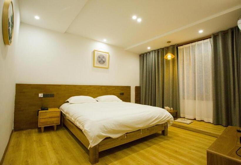 Standardrum King Size Säng, Wally House青山惠风民宿