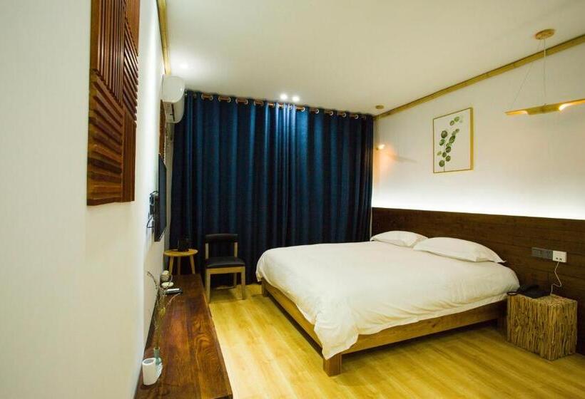 Standardrum King Size Säng, Wally House青山惠风民宿