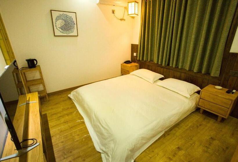 Standardrum King Size Säng, Wally House青山惠风民宿