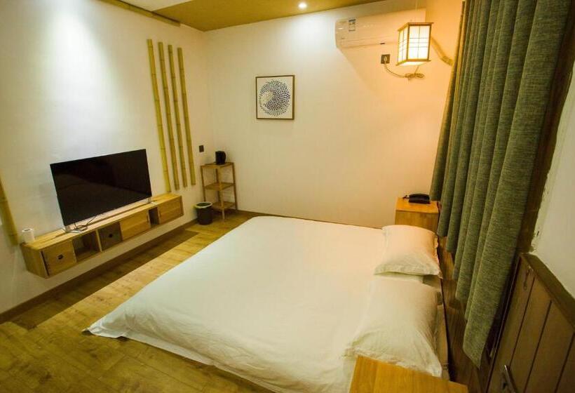 Standardrum King Size Säng, Wally House青山惠风民宿