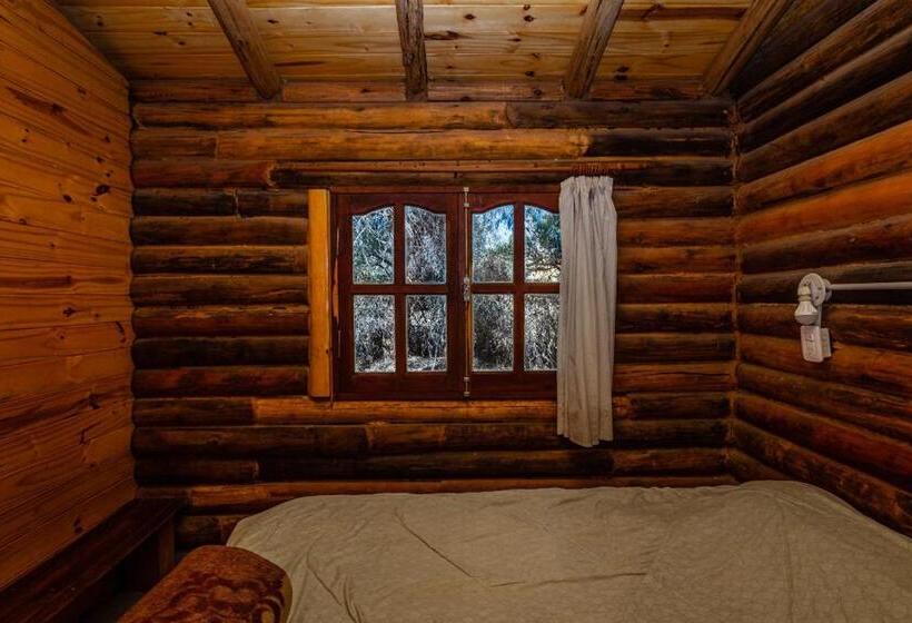 标准平房, Posada Arco Iris