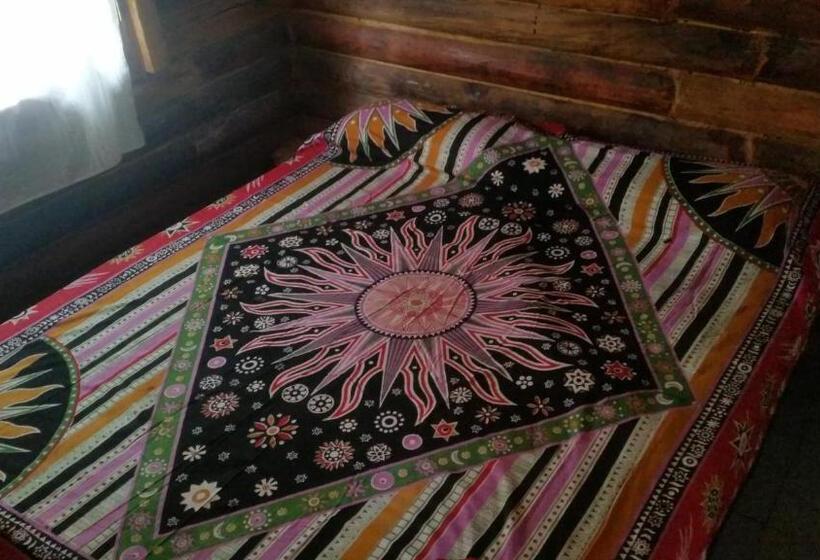 标准平房, Posada Arco Iris