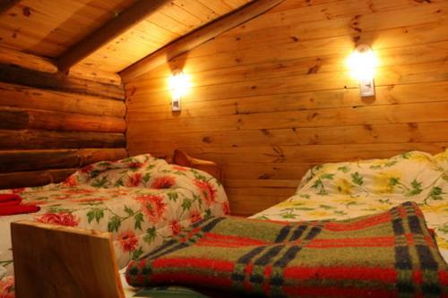 标准平房, Posada Arco Iris