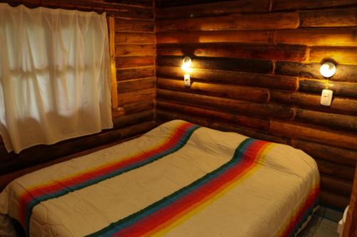 标准平房, Posada Arco Iris