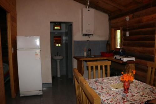 标准平房, Posada Arco Iris