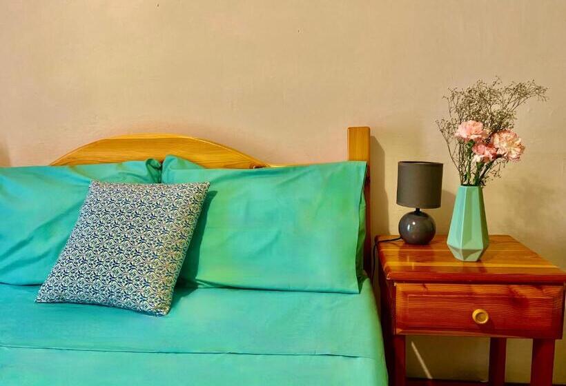 اتاق راحتی سه تخته, Grotto's Paradise B&b