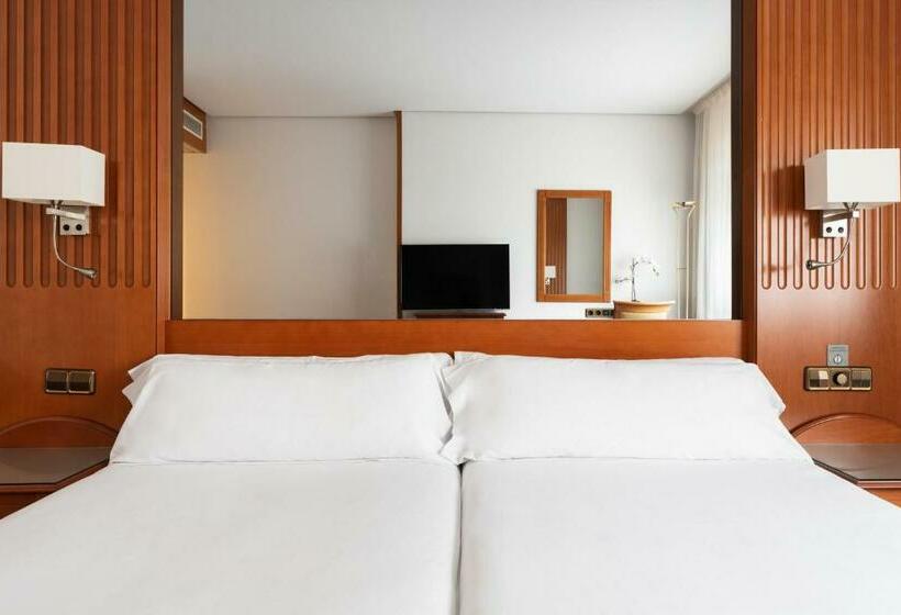 اتاق اکونومی, Exe Coruna