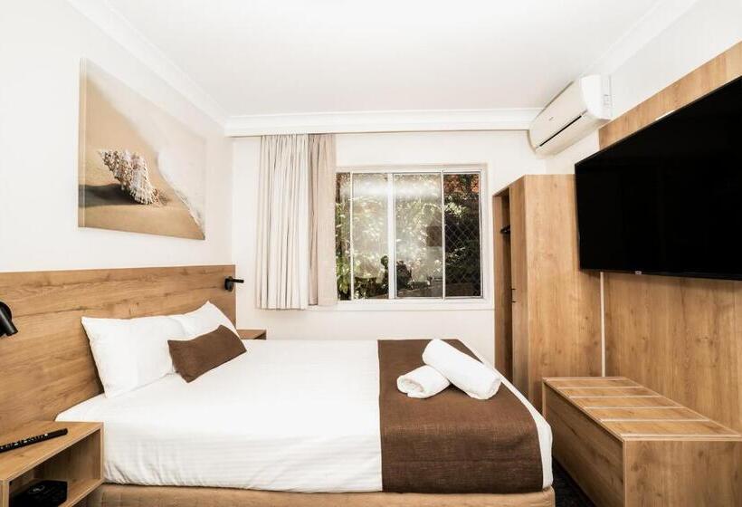Quarto Triplo Estandar, Caribbean Motel