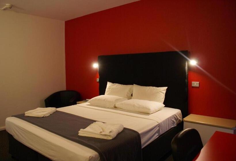 キングサイズベッドのスタンダードルーム, Darwin Poinciana Inn