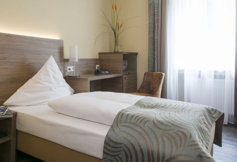 Quarto Estandar Individual, Schlicker