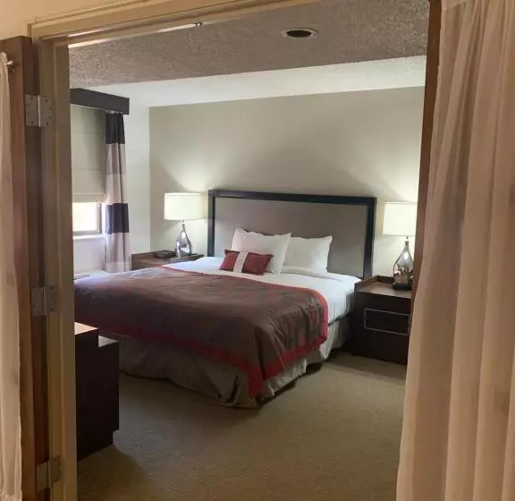 Deluxe Suite King Bed, Ramada By Wyndham Marquette