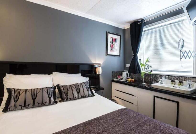 共用浴室的经济型房间, Paskins Town House