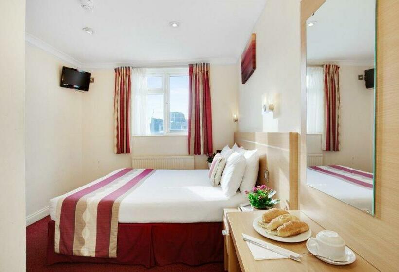 Номер Стандарт, Queens Park