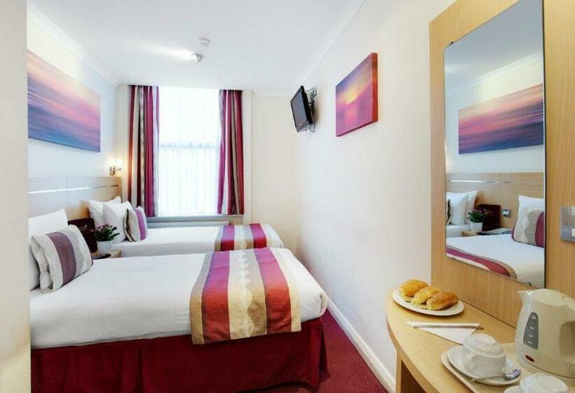 Номер Стандарт, Queens Park