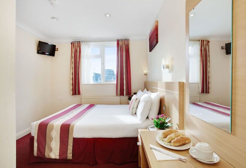 Номер Стандарт, Queens Park