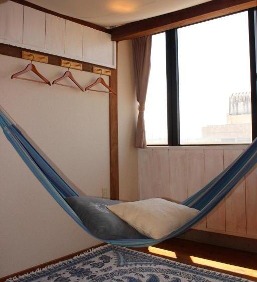 اتاق استاندارد چهارنفره با سرویس بهداشتی مشترک, Guest House Holoholo Ishigakijima