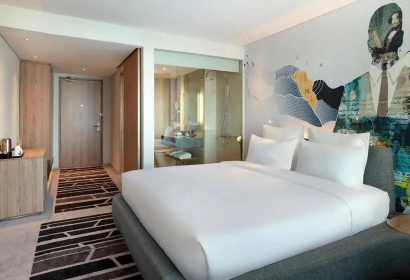 キングサイズベッドのデラックスルーム, Novotel Jakarta Cikini