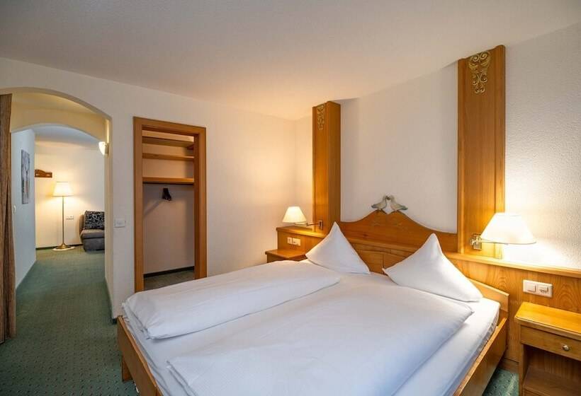 חדר משפחתי נוף להרים, Grichting Hotel & Serviced Apartments