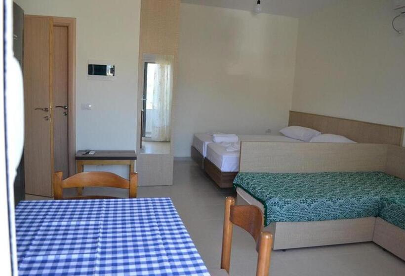 סטודיו משפחתי, Villa Melodia Xhek