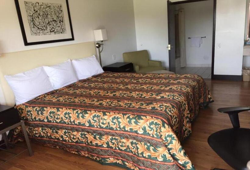 クイーンサイズベッドのスタンダードルーム, Economy Inn Of Holland