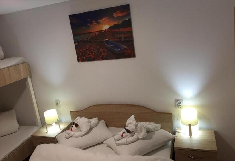 Quarto Quadruple Clássico, Casa Nicholas