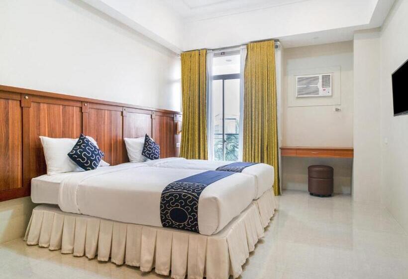 Deluxe Rum, Capital O 460 World Palace