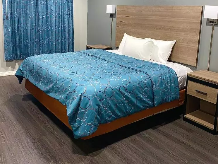 キングサイズベッドのデラックスルーム, Budget Host Inn