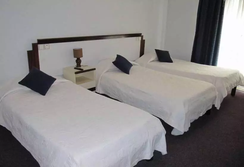 اتاق استاندارد سه نفره, Residencial Moçambique