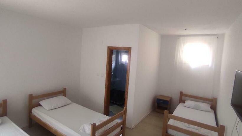 Economy Triple Room, & Rooms Lombrelle