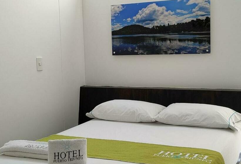 Номер Стандарт, Puerto Triunfo