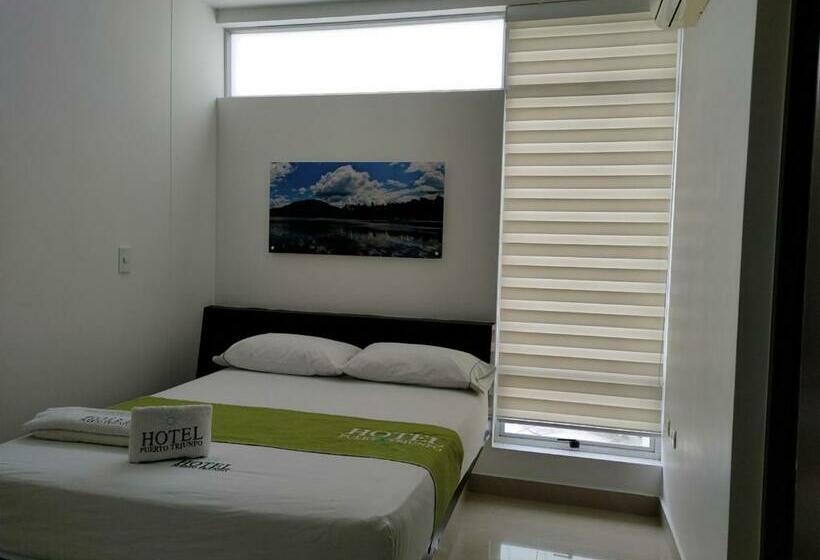 Номер Стандарт, Puerto Triunfo