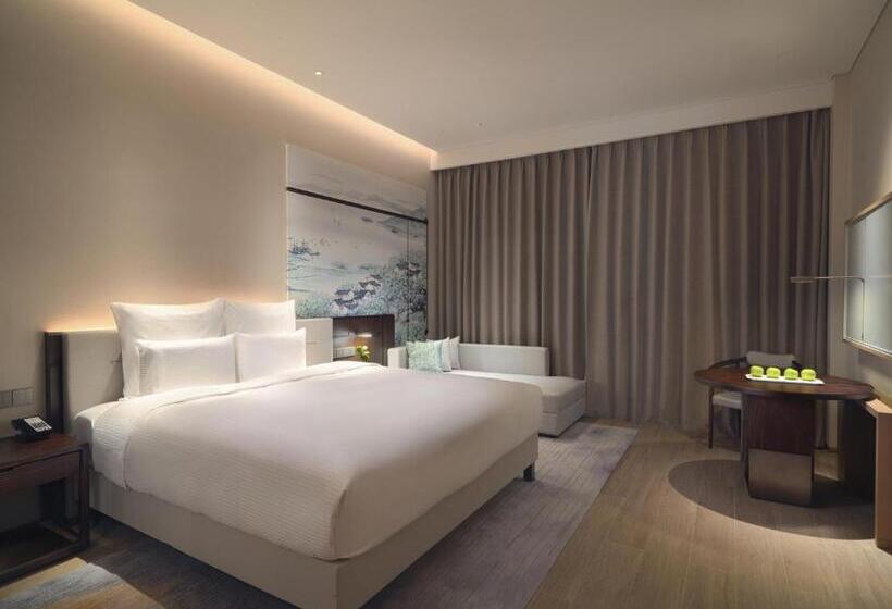 キングサイズベッドのデラックスルーム, Pullman Yueyang