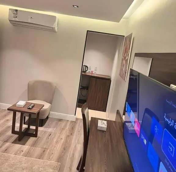 キングサイズベッドのデラックスルーム, Amwaj Alshatie Furnished Units