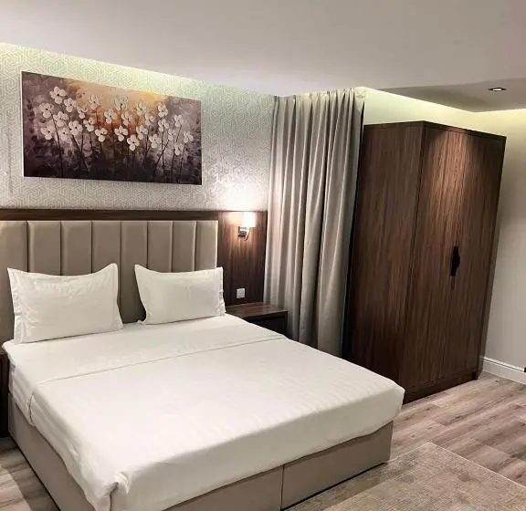キングサイズベッドのデラックスルーム, Amwaj Alshatie Furnished Units