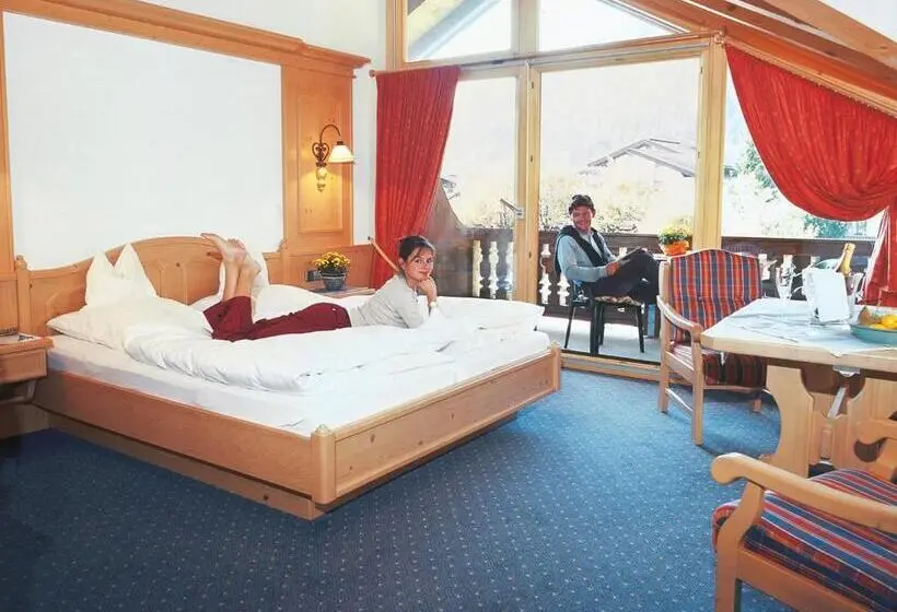 Huoneisto 1 Makuuhuone, Gästehaus Weißes Rössl
