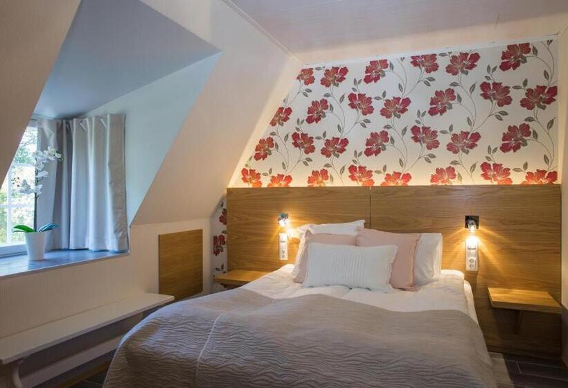 Номер Стандарт, Joensuun Tilan Päärakennus