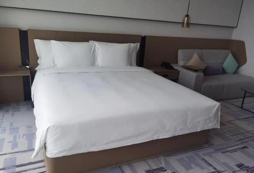 キングサイズベッドのスタンダードルーム, Crowne Plaza Dalian Xinghai, An Ihg