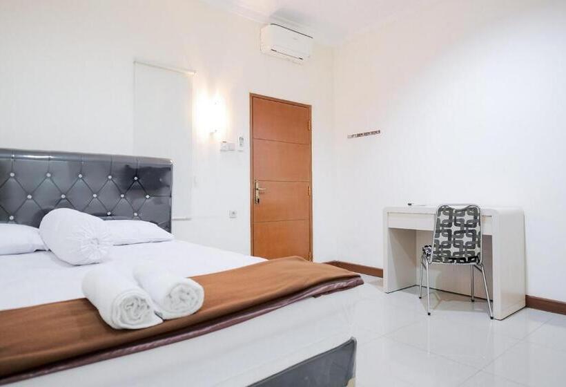 经济房, Wisma Delapan Mitra Reddoorz