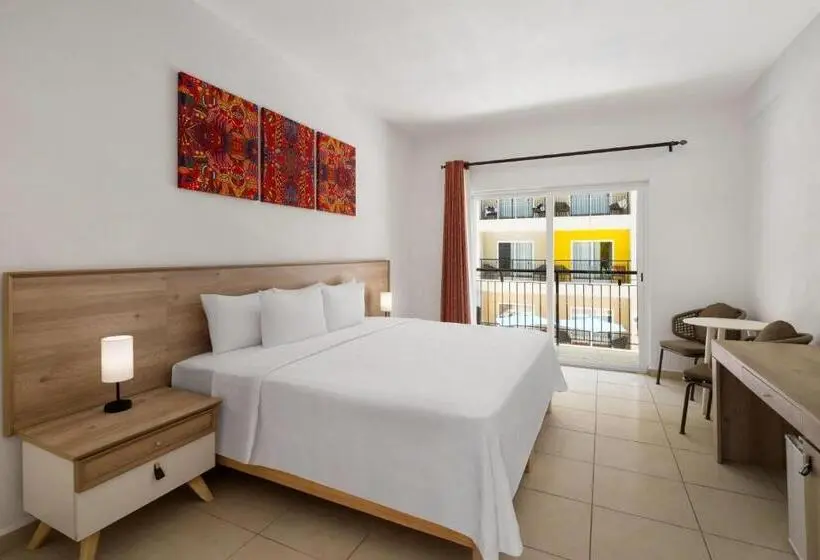 キングサイズベッドのスタンダードルーム, Decameron Isla Coral Guayabitos, Ramada All Inclusive Resort