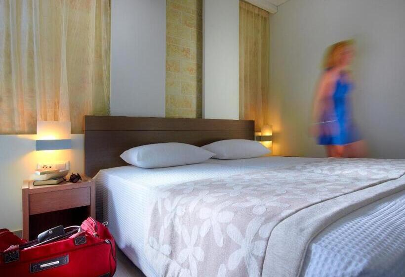 标准工作室, Minos Village