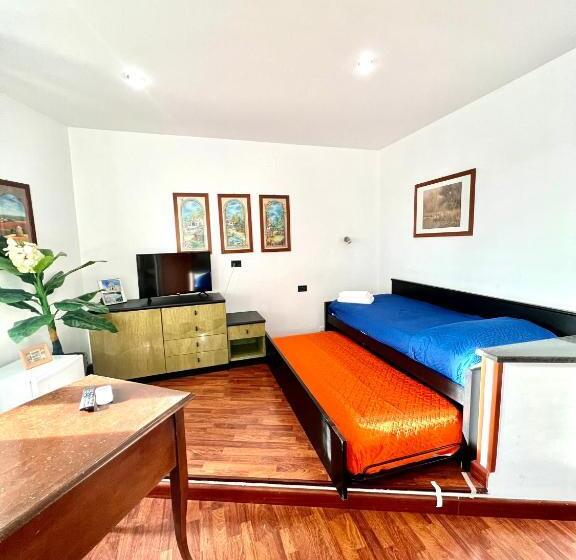 デラックスの４人部屋, Como